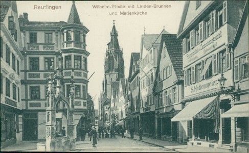 Alte Ansichtskarte Reutlingen, Wilhelm-Straße mit Linden-Brunnen und Marienkirche